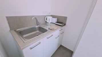 Fridge, microwave, electric kettle, toaster