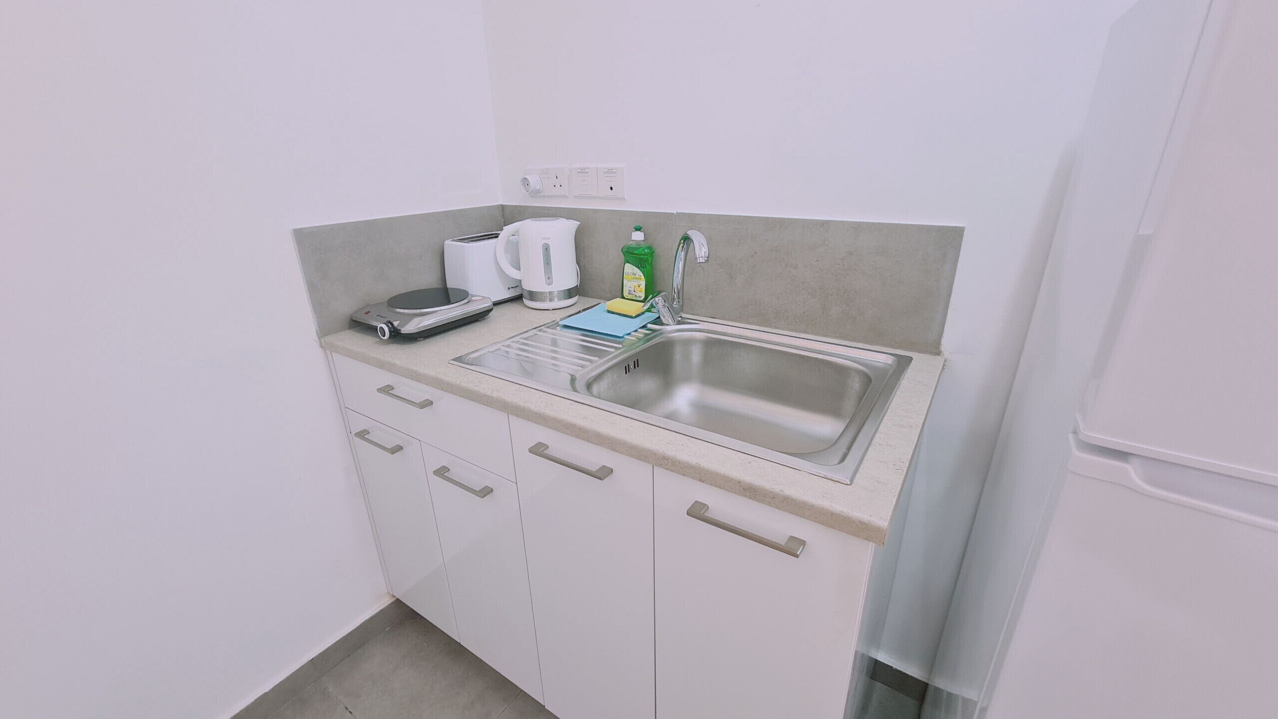Fridge, microwave, electric kettle, toaster