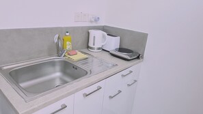 Fridge, microwave, electric kettle, toaster