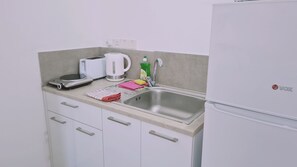Fridge, microwave, electric kettle, toaster
