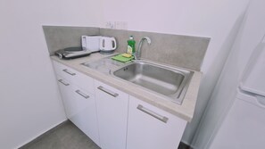 Fridge, microwave, electric kettle, toaster