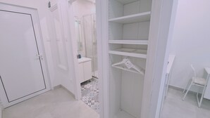 A clean, white bathroom with a shower, a toilet, and a sink. - STAY Napa Oasis Studio (Ayia Napa)