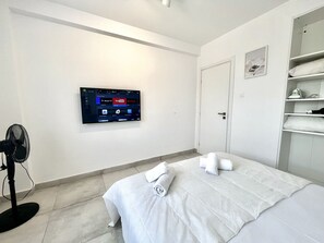 1 dormitorio, tabla de planchar con plancha, wifi gratis y ropa de cama