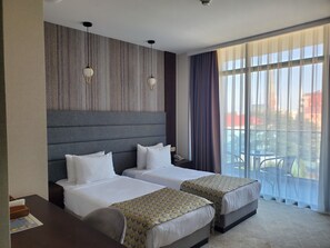 Family Room | Desk, soundproofing, iron/ironing board, free WiFi - Hotel Salvador (Batumi)