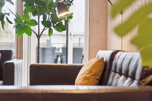 Modern summer house in Pøt with spa & sauna