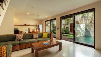Villa | Living room | 24-inch flat-screen TV with cable channels