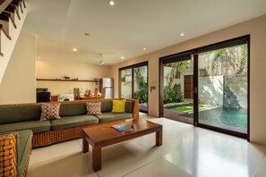 Villa | Living room | 24-inch flat-screen TV with cable channels - Du Ciel Villa by Betterplace (Canggu)