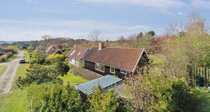 Idyllic holiday home near cliffs and beach