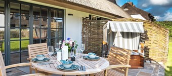 Exkl. Luxus-hausteil Unter Reet mit 4 Zimmern auf ca. 150 m², für bis zu 6 Pers