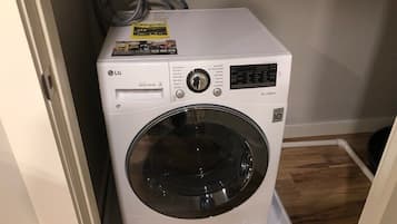 Apartment, Private Bathroom, City View | Laundry room