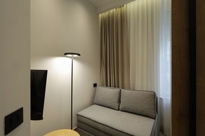 Junior Suite | Living area | 40-inch Smart TV with cable channels - Hop Inn Rooms & Suites Belgrade (Belgrade)
