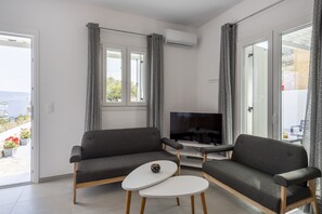 Lägenhet | Vardagsrum | 38-tums platt-tv med satellitkanaler