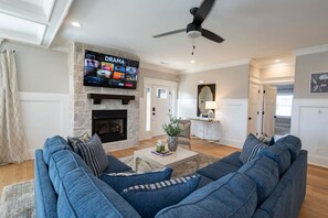 TV, fireplace - Modern 4BR Oasis - Main Level Master + 2 King Beds (Forest)