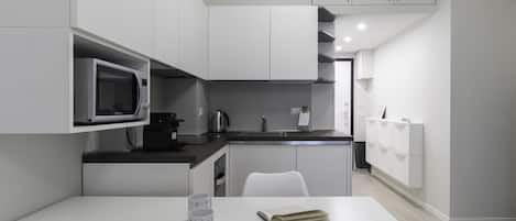 Apartment (1 Bedroom) | Private kitchen | Fridge, microwave, oven, stovetop