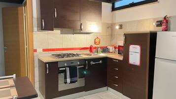 Apartment | Private kitchen | Oven, electric kettle, cookware/dishes/utensils, freezer