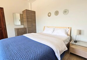 1 غرفة نوم ومكواة/لوح كي وواي فاي وملاءات أسرّة