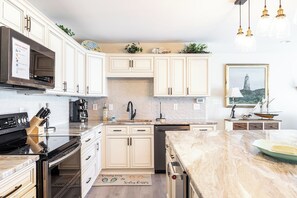 Fridge, microwave, oven, dishwasher - Ocean Terrace #2, Oceanfront Condo in Pine Knoll Shores, NC! (Pine Knoll Shores)