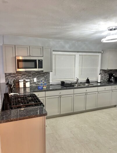 Relax with your family in this newly renovated home away from home.