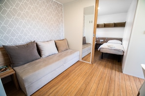 2 quartos, acesso à internet, roupa de cama