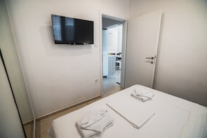1 dormitorio, tabla de planchar con plancha, Internet y ropa de cama