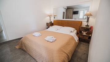 1 slaapkamer, een strijkplank/strijkijzer, internet, beddengoed