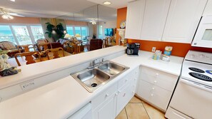 Fridge, microwave, stovetop, coffee/tea maker