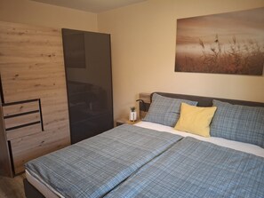 2 dormitorios, tabla de planchar con plancha, Internet y ropa de cama