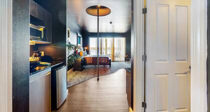 An unforgettable stay awaits at this sultry Delton Grand studio with dance pole