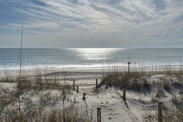 Beach access steps away - just cross the sands dunes.