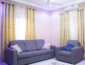 Standard Double Room | Living area | 32-inch Smart TV with satellite channels