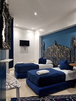 Habitación cuádruple familiar, varias camas | Wifi gratis y ropa de cama