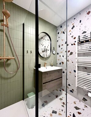 Shower, hair dryer, towels, soap