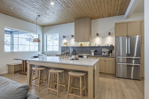 Modern Duplex w/ private hot tub, EV charger & media room - pet friendly too!