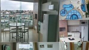 A hotel room with a balcony, a dining area, a kitchen, a bathroom, and a bed. - Temporada Fiore Prime Caldas Novas (Caldas Novas)