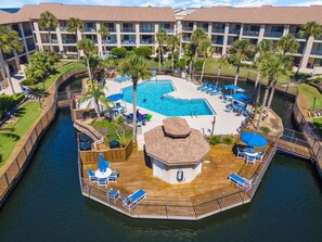 Outdoor pool, a heated pool - Southern C's Beachfront condo, tropical heated pool, great for family or couple (St. Augustine Beach)