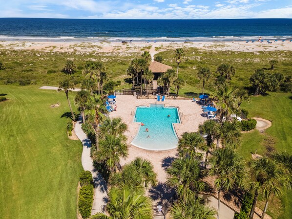 Outdoor pool, a heated pool - Southern C's Beachfront condo, tropical heated pool, great for family or couple (St. Augustine Beach)