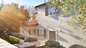 A two-story house with a stone facade, a tiled roof, and a small front garden with a pathway leading to the entrance. - House 2303/98197 (Istria - Rakovci), 10000m from the beach (Rakovci)