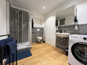 Hair dryer, towels, soap, toilet paper