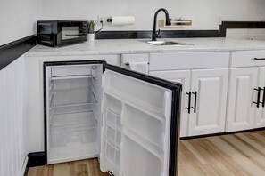 Fridge, microwave, cookware/dishes/utensils