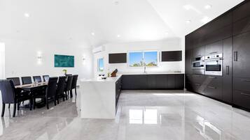 Villa | Private kitchen | Fridge, microwave, oven, stovetop