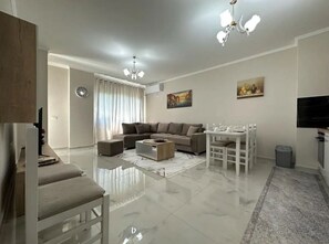 City Apartment | Living area | 43-inch LED TV with digital channels