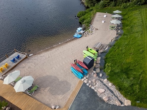 On the beach, sun loungers - RV 5   Rustic Charm w/ Queen Bed with Forest Background (Kenora)