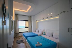 1 dormitorio, tabla de planchar con plancha, wifi y ropa de cama