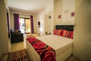 1 غرفة نوم ومكواة/لوح كي وواي فاي وملاءات أسرّة