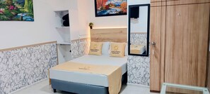 Family Twin Room | Desk, free WiFi, bed sheets - Hotel Eterna Primavera (Medellín)