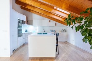 Microwave, oven, dishwasher - GuestHost - Travel with your family and friends and explore lakes and mountains near Como!This large attic, with two bedrooms, two bathrooms, open space kitchen with island, large living room, terraces and patio for relaxing, is located on the road that  (Cesana Brianza)