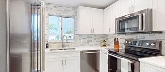 Dog-friendly duplex with a patio, deck, washers, dryers, & central AC