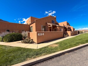A modern building with a flat roof and stucco exterior, labeled '4A4'. - Rim Vistas - 4A4 (Moab)