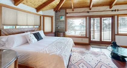 Waterview dog-friendly retreat with beach access, hot tub, and large deck