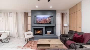 Smart TV, fireplace, foosball
